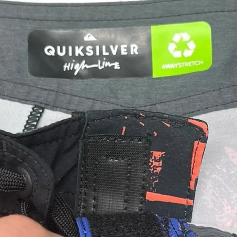 Quiksilver High Line stretch newsprint blue orange black board shorts size 28